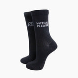 Black socks with 'Witch, Please' text on a white background