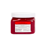 A jar of Glowing body scrub in a deep berry red shade, featuring a white lid and a white label with red and black text, shown against a plain white background.