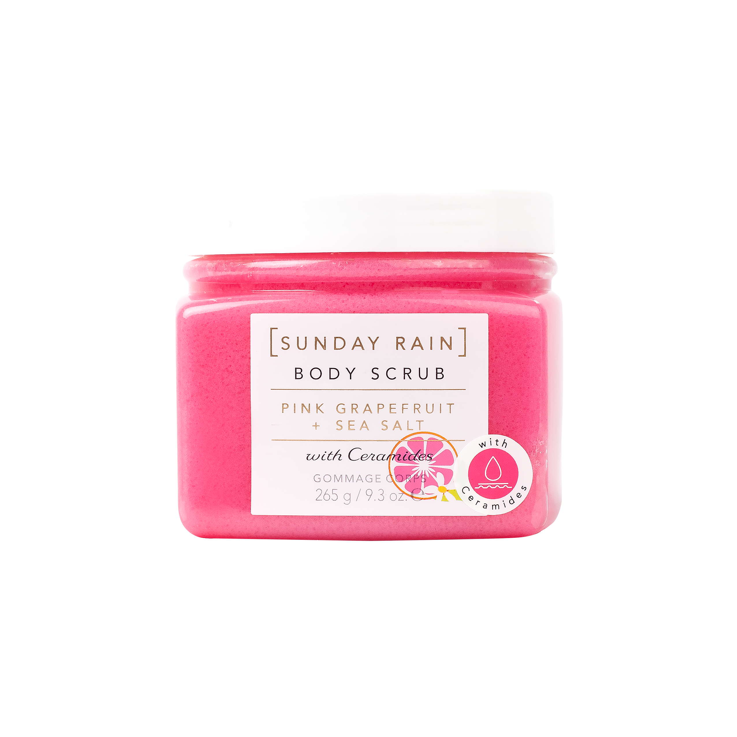 Pink body scrub jar with a white label on a white background