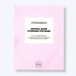 Vitamasques Crystal Glow Hydrogel Eye Mask packaging on a light pink background
