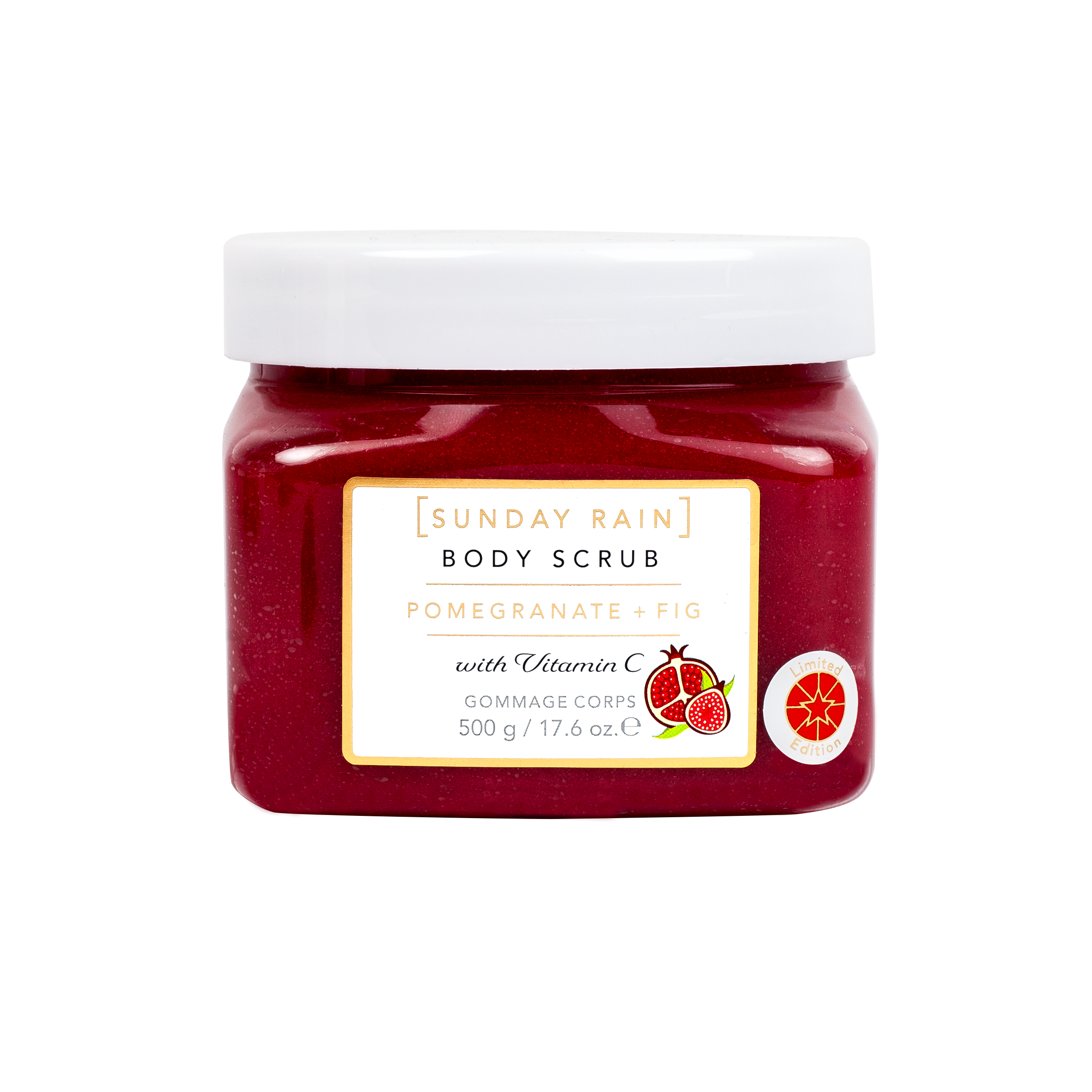 A jar of Sunday Rain Body Scrub, Pomegranate + Fig, featuring a deep red scrub visible through the clear container, a white lid, and a white label with gold accents.