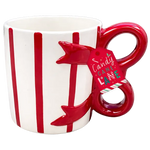A white ceramic mug with red vertical stripes and a red handle shaped like a candy cane, featuring a hanging tag that reads 'Candy Cane Love'.